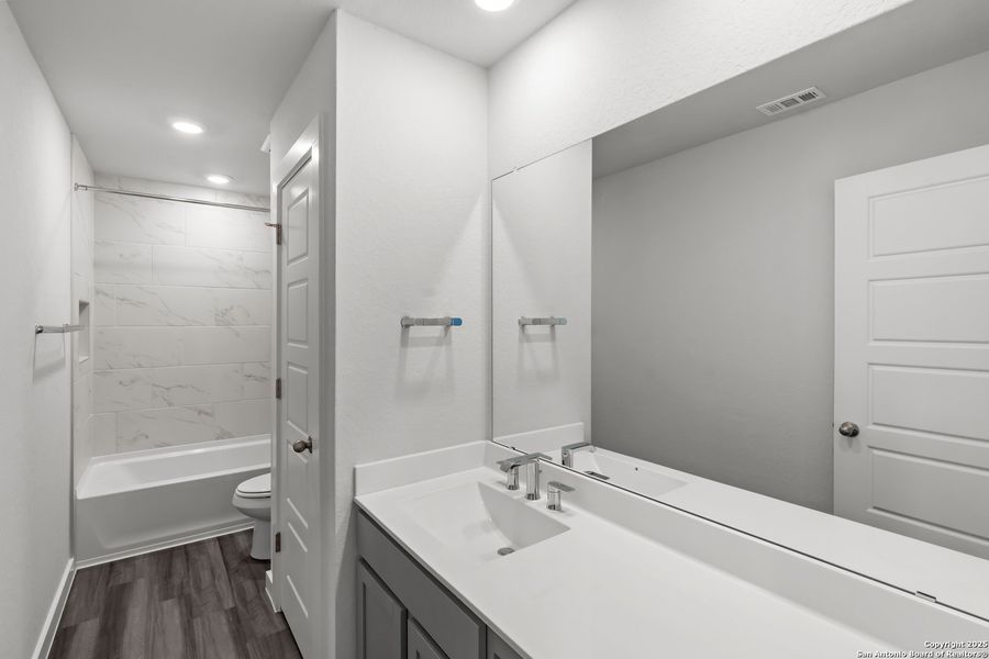 Furnished interior view inside a new home in The Meadows at Hunters Ranch, San Antonio (Image 5).