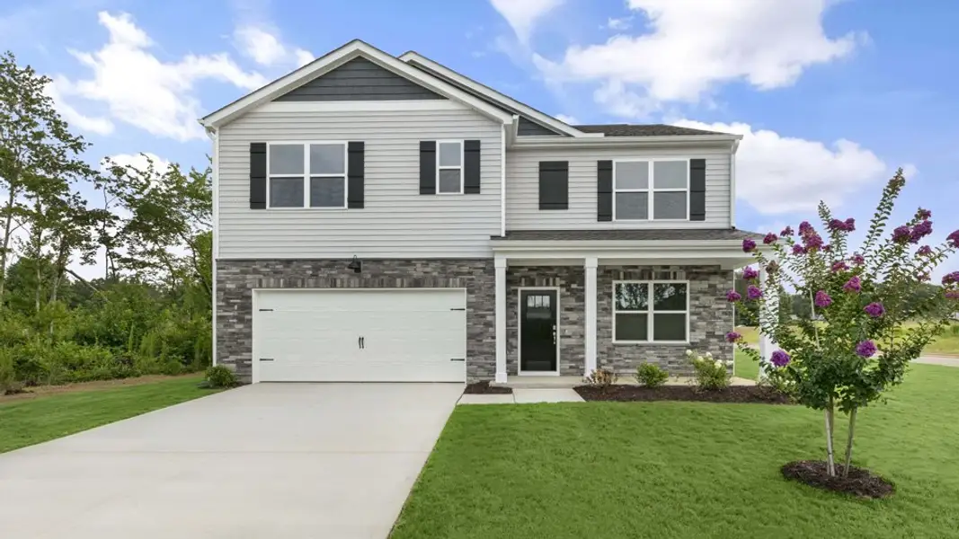 Front exterior of a new home in Villa Grande, Winterville, NC, highlighting curb appeal (Image 1). Front exterior of a new home in Villa Grande, Winterville, NC, highlighting curb appeal (Image 1).