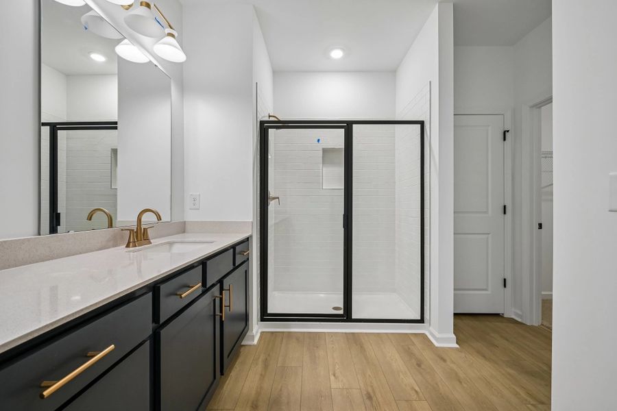 Primary Bath featuring the AW Collection® Sapphire - Clean white and cool hues define the space. Primary Bath featuring the AW Collection® Sapphire - Clean white and cool hues define the space.