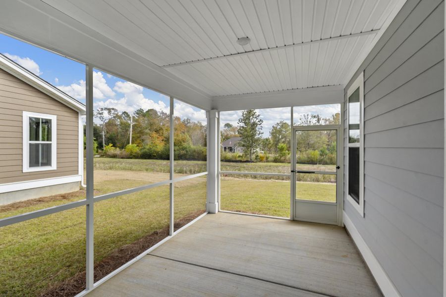 Exterior details and patio area of a home in Wildcat Chase, Summerville (Image 3).