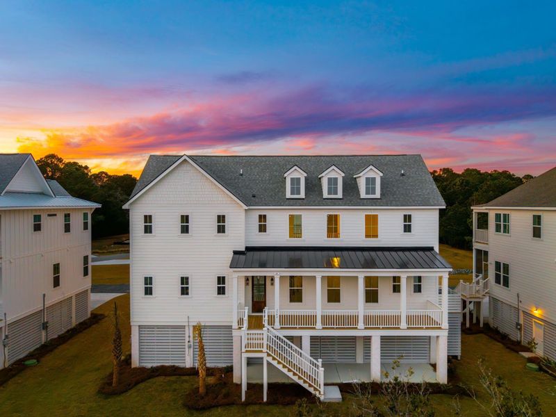 Exterior details and patio area of a home in Overlook at Copahee Sound, Awendaw (Image 32).