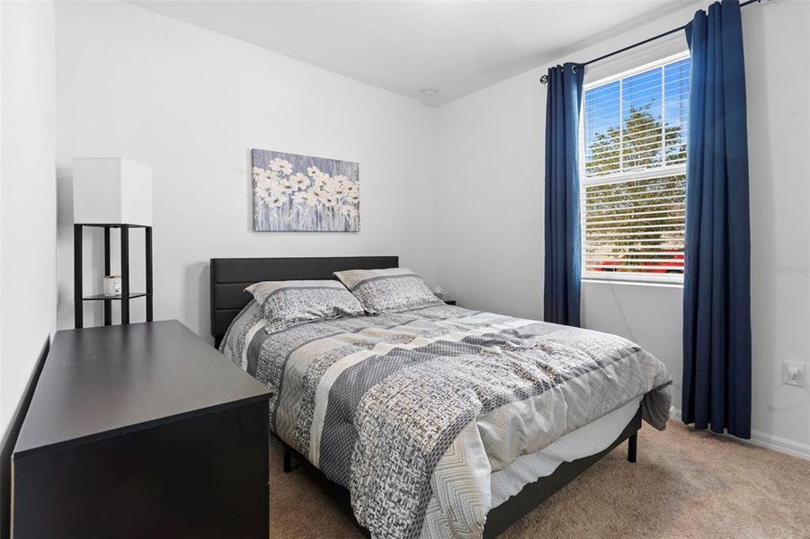 Furnished interior view inside a new home in Deer Run at Crosswinds, Davenport (Image 11).