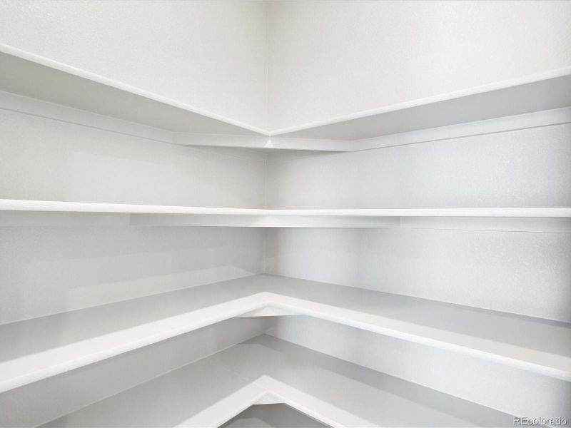 Furnished interior view inside a new home in Buffalo Highlands: The Canyon Collection, Commerce City (Image 19).