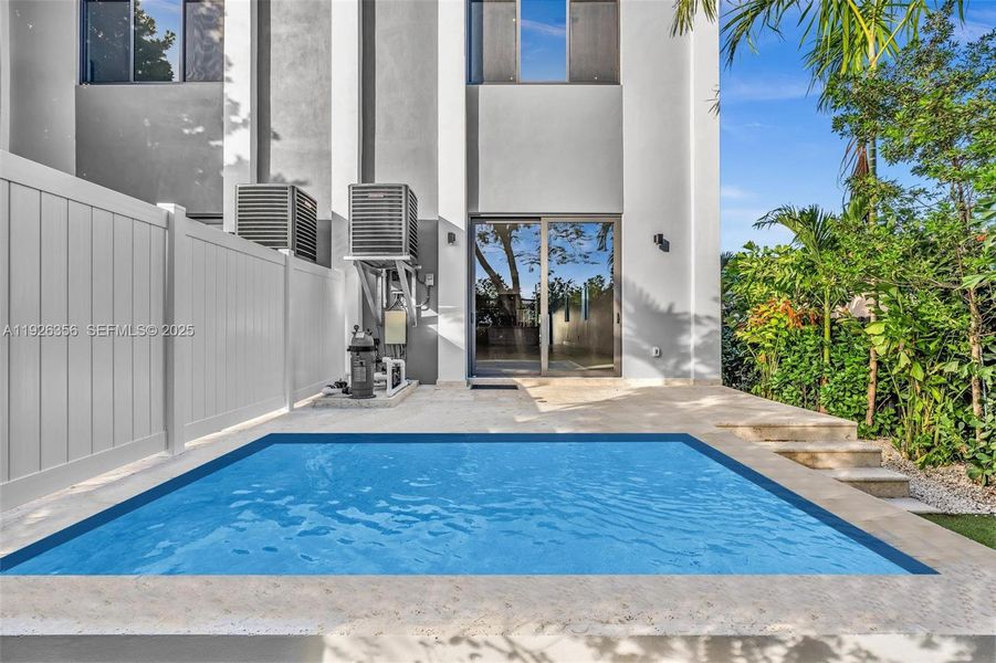 Exterior details and patio area of a home in , Miami (Image 30). Exterior details and patio area of a home in , Miami (Image 30).