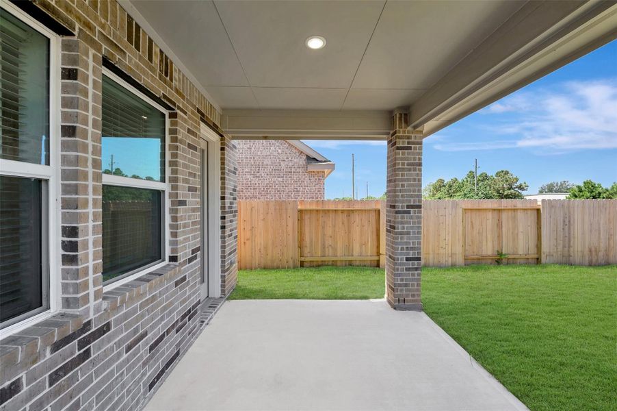 Enjoy the outdoors on the covered patio Enjoy the outdoors on the covered patio