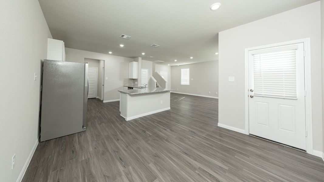 Dining Area to Kitchen and Family Room