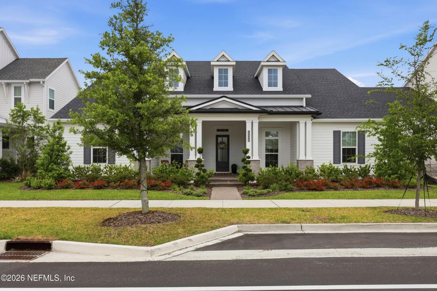 Front exterior of a new home in Seven Pines 70' Rear Entry, Jacksonville, FL, highlighting curb appeal (Image 28).