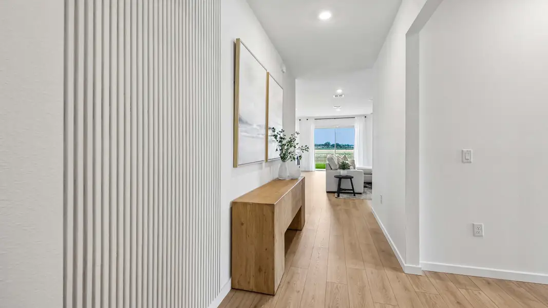 Furnished interior view inside a new home in Mockingbird Reserve at Winding Oaks, Ocala (Image 3).
