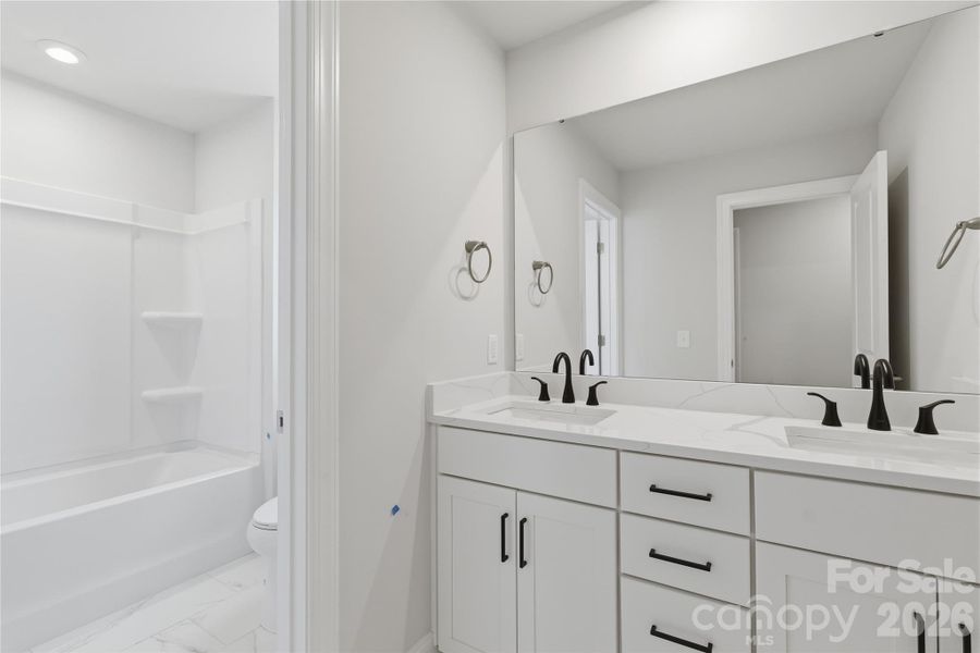 Example Photo Example Photo