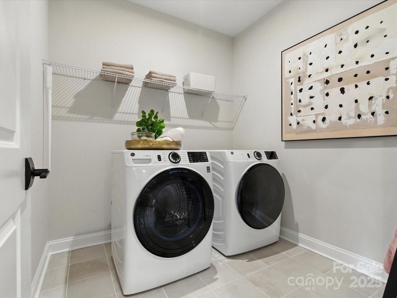 Large laundry room that is more than just a closet. *Model Photos | Actual finishes, orientation, and structural selections may vary.