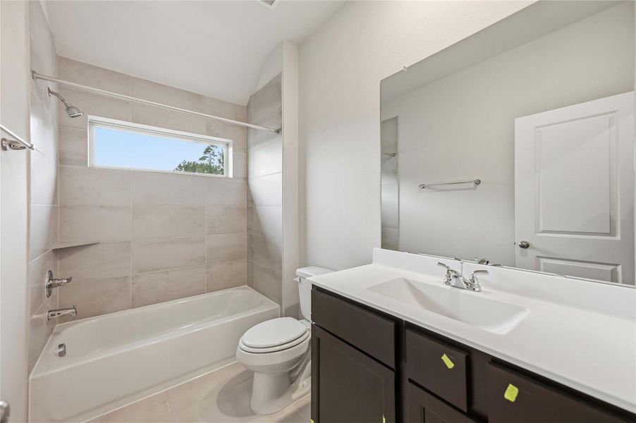 Furnished interior view inside a new home in Sundance Cove, Crosby (Image 7).
