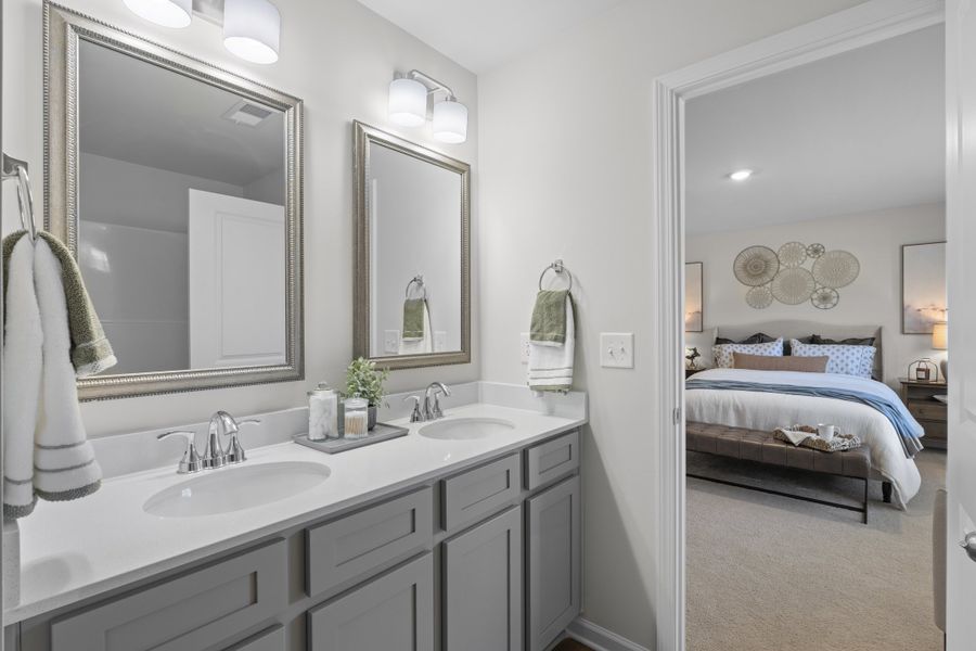 Representative furnished interior of a home built from the Walnut by McGuinn Homes in Hunters Branch Townhomes, Hopkins (Image 16).