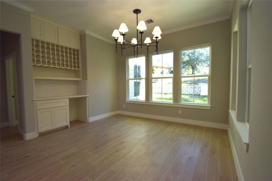 Dining room with custom wine rack