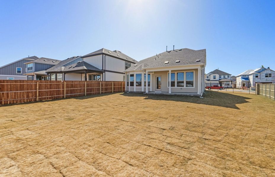 Exterior details and patio area of a home in Santa Rita Ranch, Liberty Hill (Image 26).