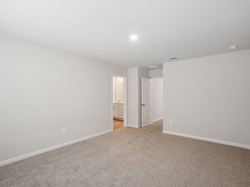 Spacious, unfurnished interior of a new home in Marshburn Landing - Bungalow Series, Wendell (Image 16). Spacious, unfurnished interior of a new home in Marshburn Landing - Bungalow Series, Wendell (Image 16).