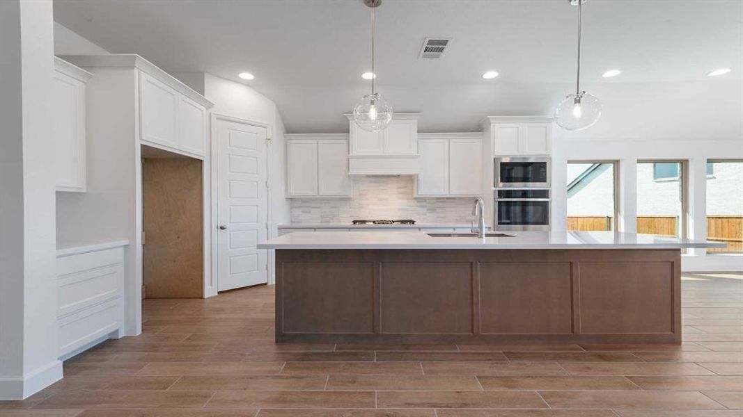 Furnished interior view inside a new home in The Heights At Uptown Celina 50', Celina (Image 5).