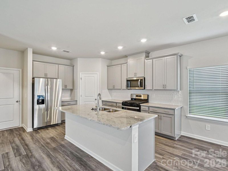 Photo is not of the actual home, but is an inspirational photo of builder’s model home and may depict options, furnishings, and/or decorator features that are not included