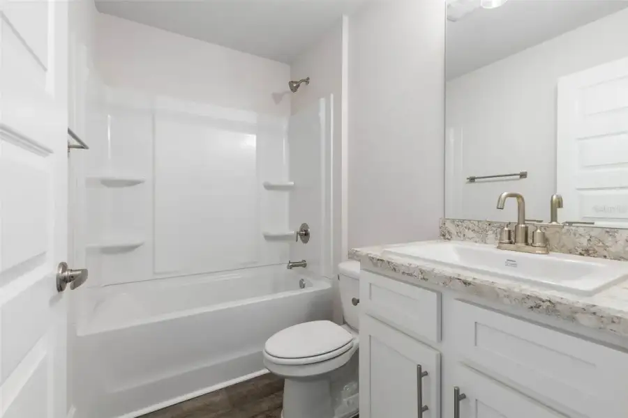 Representative furnished interior of a home built from the 2117 by Adams Homes in Flagler Estates, Hastings (Image 10).