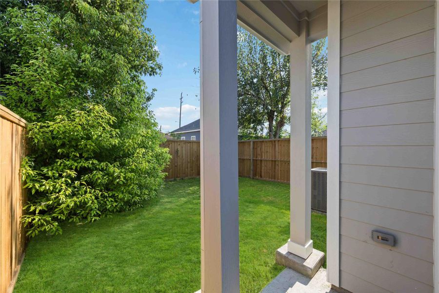 Exterior details and patio area of a home in , Houston (Image 2). Exterior details and patio area of a home in , Houston (Image 2).