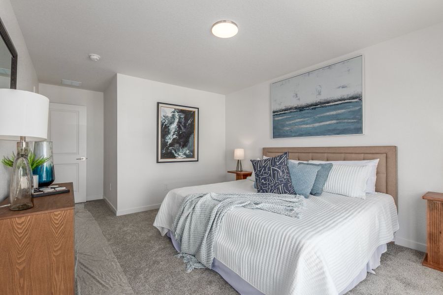 Furnished interior view inside a new home in The Commons at Victory Ridge, Colorado Springs (Image 15).