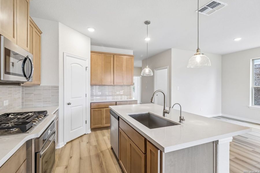 Furnished interior view inside a new home in Stream Waters, Seguin (Image 6).