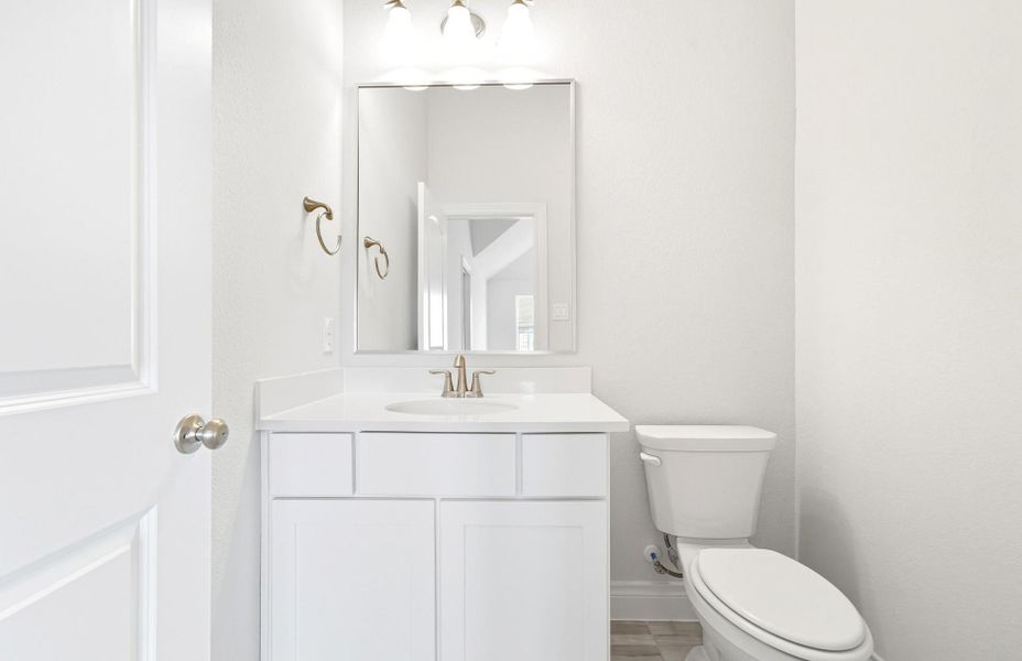 Furnished interior view inside a new home in Bridgeland 60′, Cypress (Image 6).