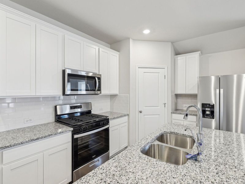 Furnished interior view inside a new home in Flora, Hutto (Image 3).