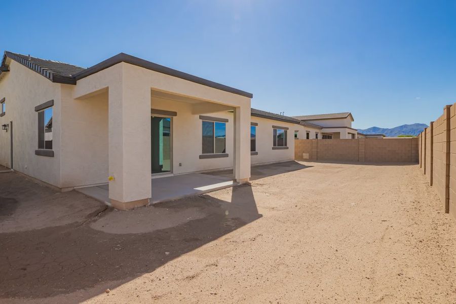 Exterior details and patio area of a home in Valencia at Granite Vista, Waddell (Image 21).