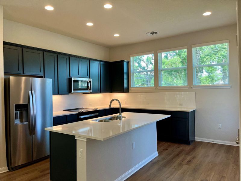 Furnished interior view inside a new home in Fleetwood, Dripping Springs (Image 6). Furnished interior view inside a new home in Fleetwood, Dripping Springs (Image 6).