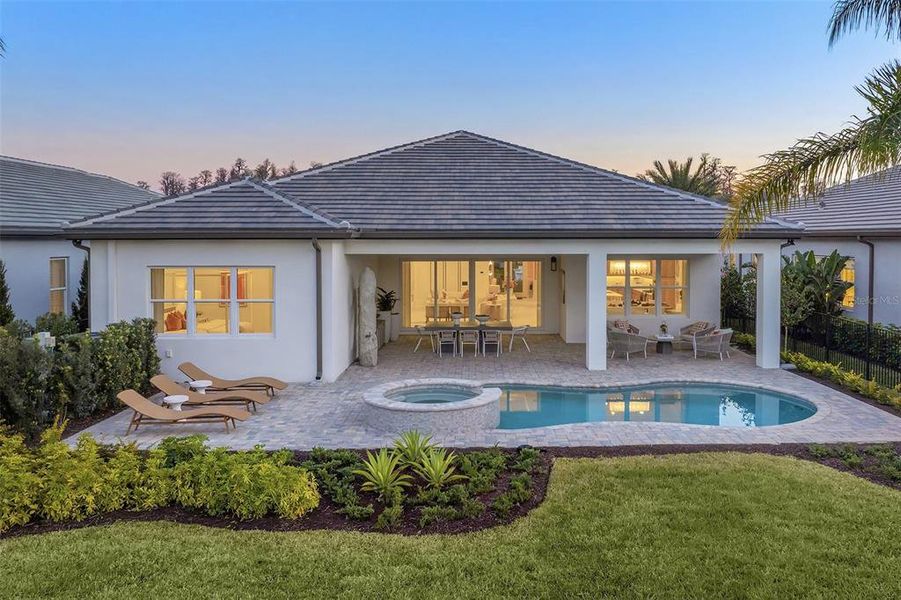 Exterior details and patio area of a home in Valencia Ridge, Wesley Chapel (Image 25).