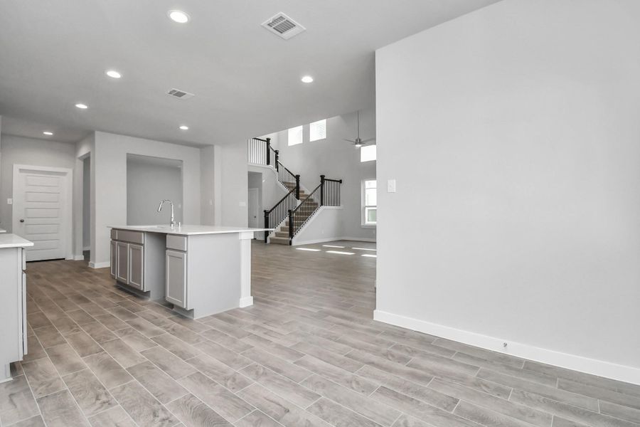 Enjoy breakfast with ease in the connected and cozy breakfast nook, seamlessly integrated with the kitchen for utmost convenience. Sample photo of completed home with similar floor plan. Actual colors and selections may vary. Enjoy breakfast with ease in the connected and cozy breakfast nook, seamlessly integrated with the kitchen for utmost convenience. Sample photo of completed home with similar floor plan. Actual colors and selections may vary.