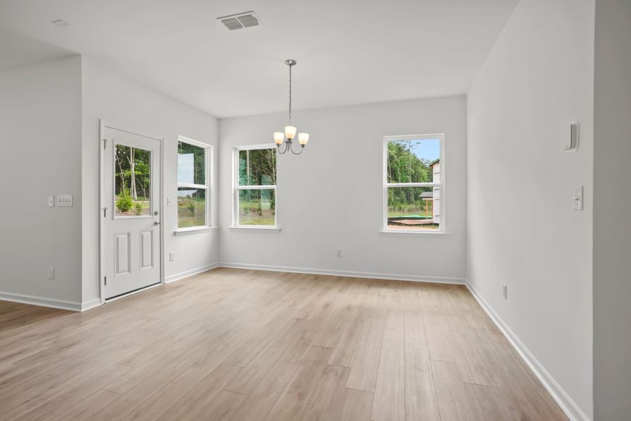 Spacious, unfurnished interior of a new home in Michaux Gardens, Belmont (Image 24).