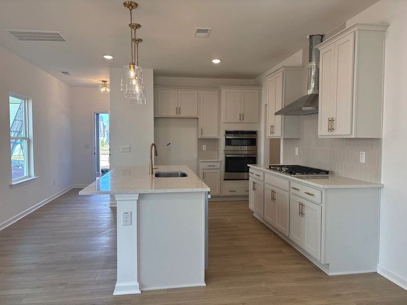 Kitchen featuring the AW Collection® Serene - Clean lines and earthy textures define the space.