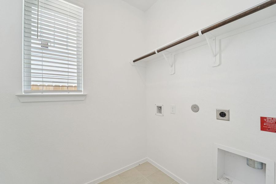 Photo is not of the actual home, but is an inspirational photo of builder’s model home and may depict options, furnishings, and/or decorator features that are not included