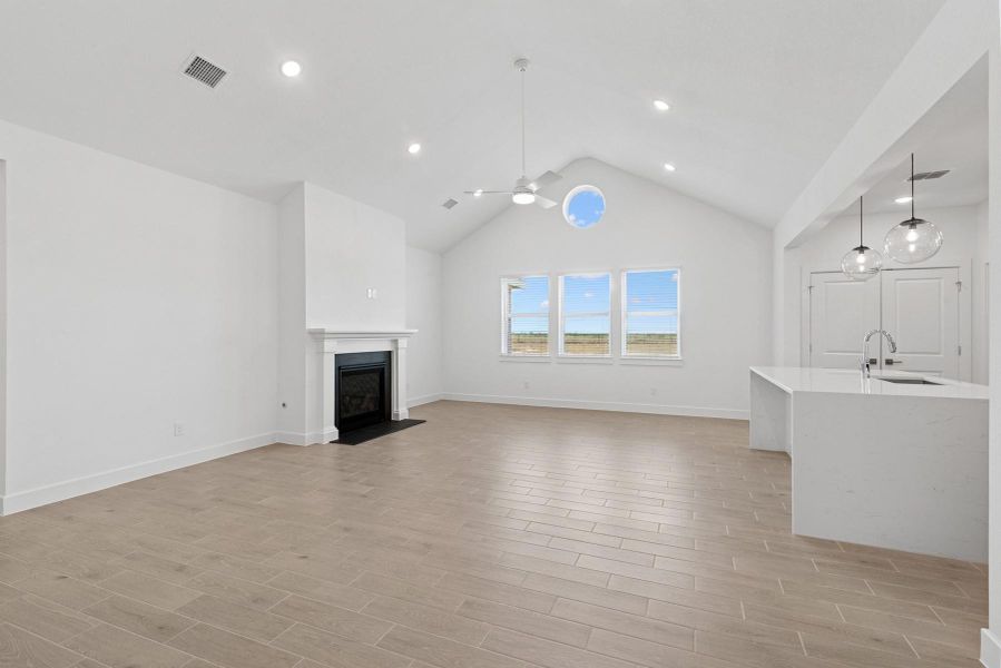 Open great room with vaulted ceilings (*Photo not of actual home and used for illustration purposes only.)