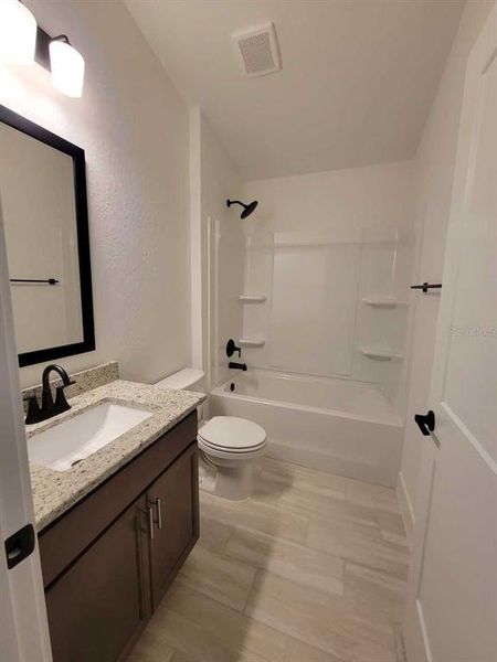 Furnished interior view inside a new home in Ocala Crossings South, Ocala (Image 6).