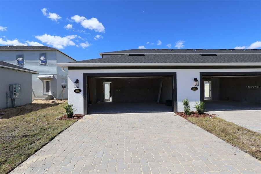 Exterior details and patio area of a home in Emerson Pointe, Apopka (Image 3). Exterior details and patio area of a home in Emerson Pointe, Apopka (Image 3).