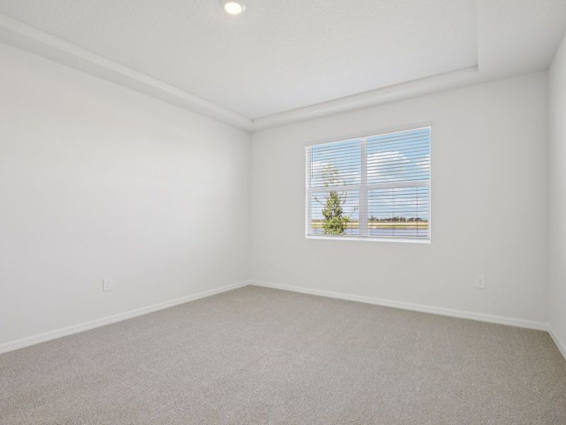 Spacious, unfurnished interior of a new home in Coasterra - Reserve Series, Palmetto (Image 12).