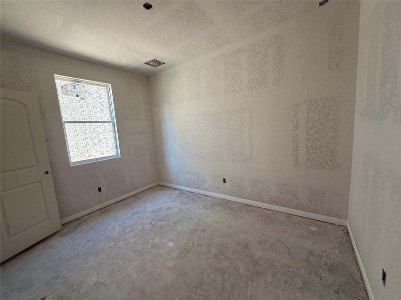 In-progress construction of a new home in The Cottages at La Cima, San Marcos, TX (Image 25).