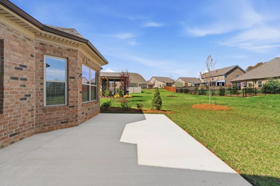 Exterior details and patio area of a home in Weybridge, Burlington (Image 4).