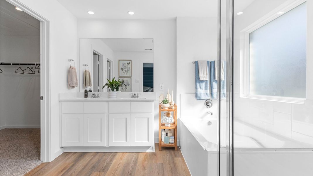 Furnished interior view inside a new home in Caldwell Crossing, Iowa Colony (Image 11).