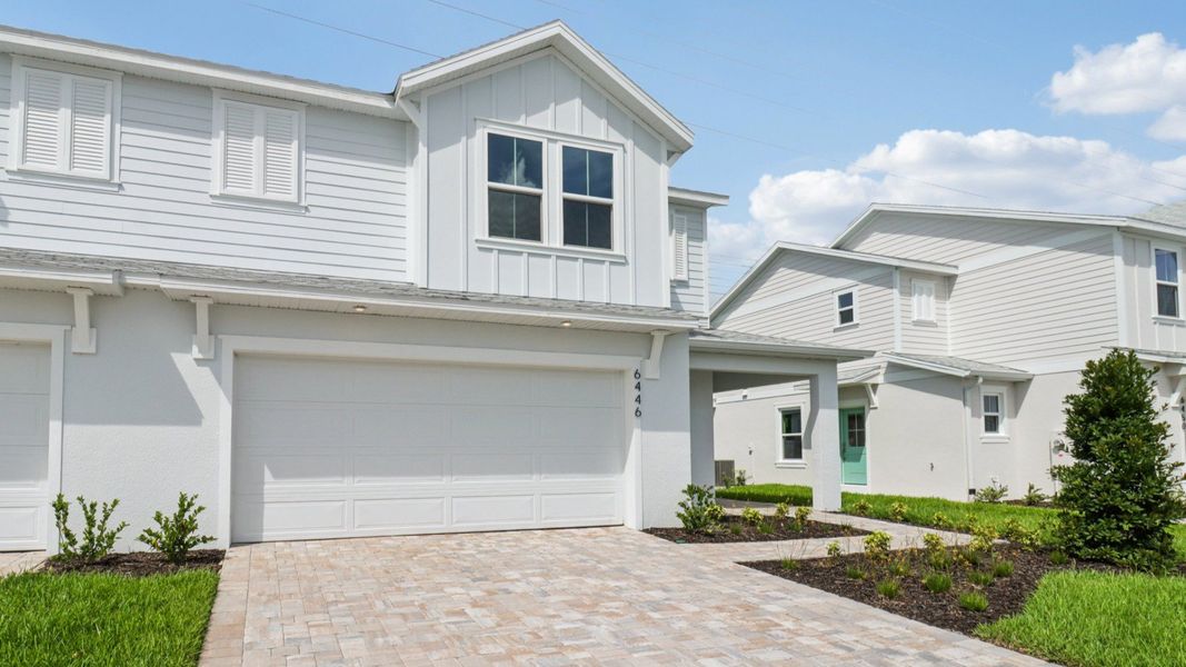 Exterior Monterey End Townhome by DRB Homes - Cyrene at Harmony in St Cloud FL
