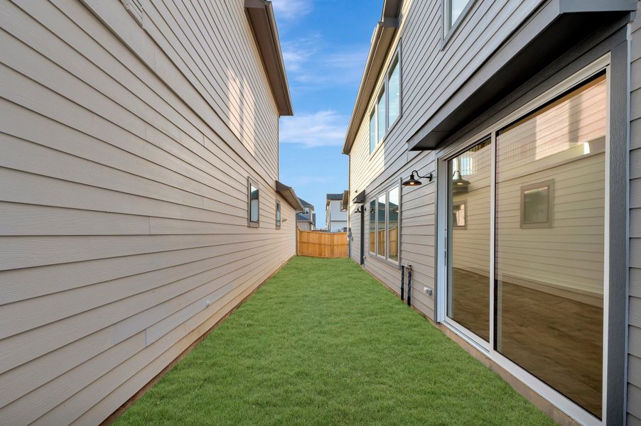 Exterior details and patio area of a home in Jubilee - Cottages Row Collection, Hockley (Image 3).