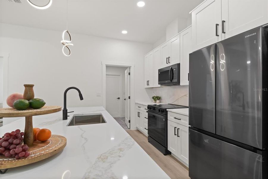 Furnished interior view inside a new home in , Port Charlotte (Image 32). Furnished interior view inside a new home in , Port Charlotte (Image 32).