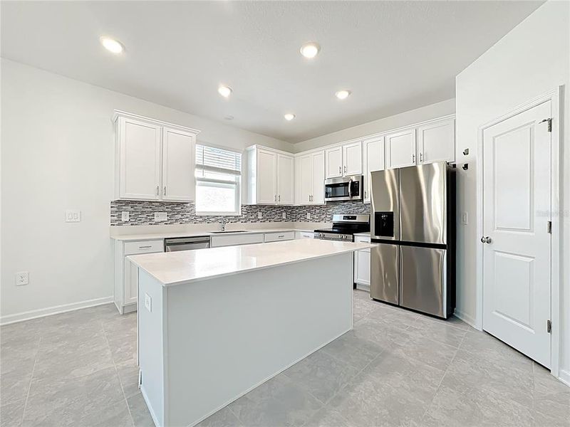 Furnished interior view inside a new home in , Kissimmee (Image 5).