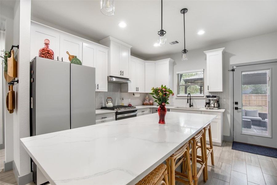 Furnished interior view inside a new home in , Roman Forest (Image 11).