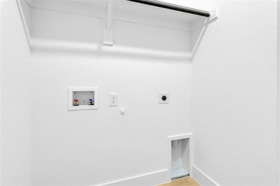 Laundry area featuring washer hookup and electric dryer hookup