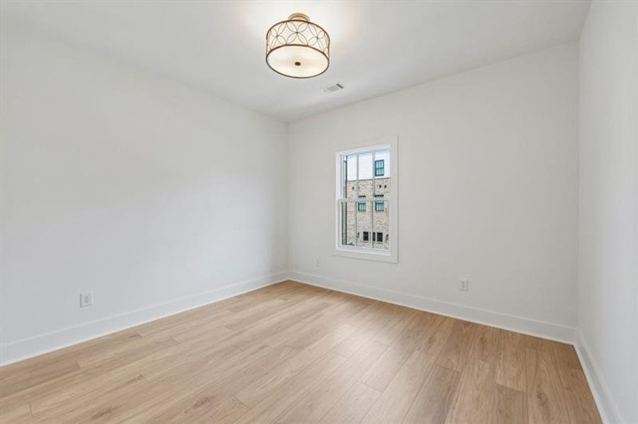 Spacious, unfurnished interior of a new home in Skyview On Broad, Sugar Hill (Image 39).