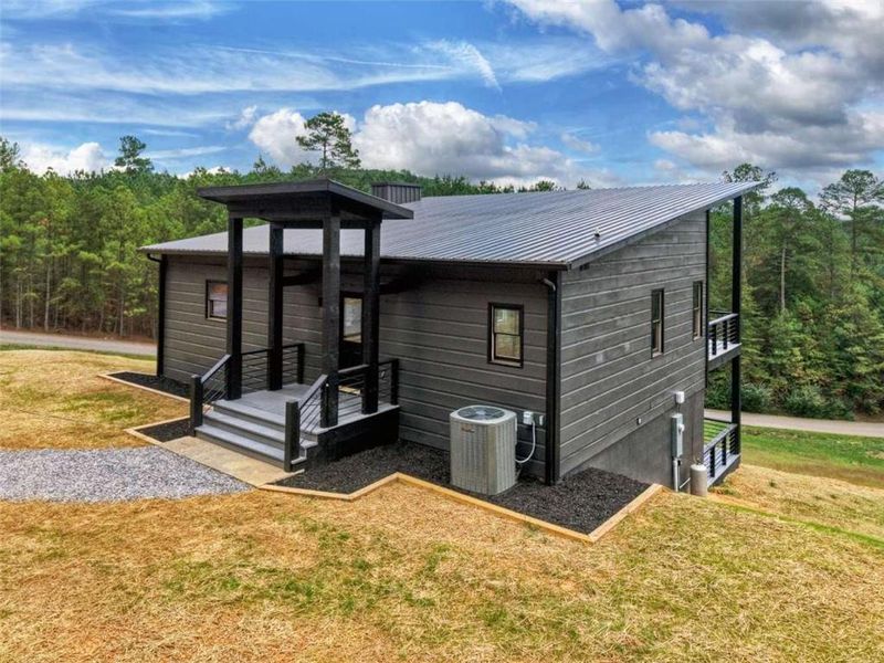 Exterior details and patio area of a home in , Turtletown (Image 15). Exterior details and patio area of a home in , Turtletown (Image 15).