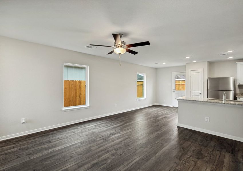 Laminate flooring flows throughout the main living area Laminate flooring flows throughout the main living area
